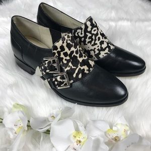Michael Kors black leather hair calf loafers